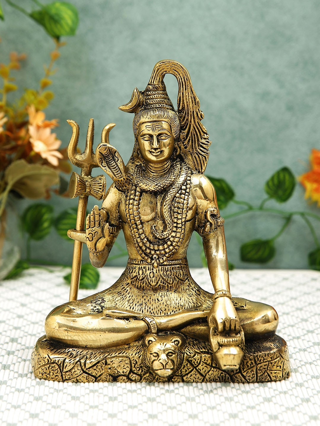 

Imli Street Yellow Textured Shiva Idol Figurine Showpieces