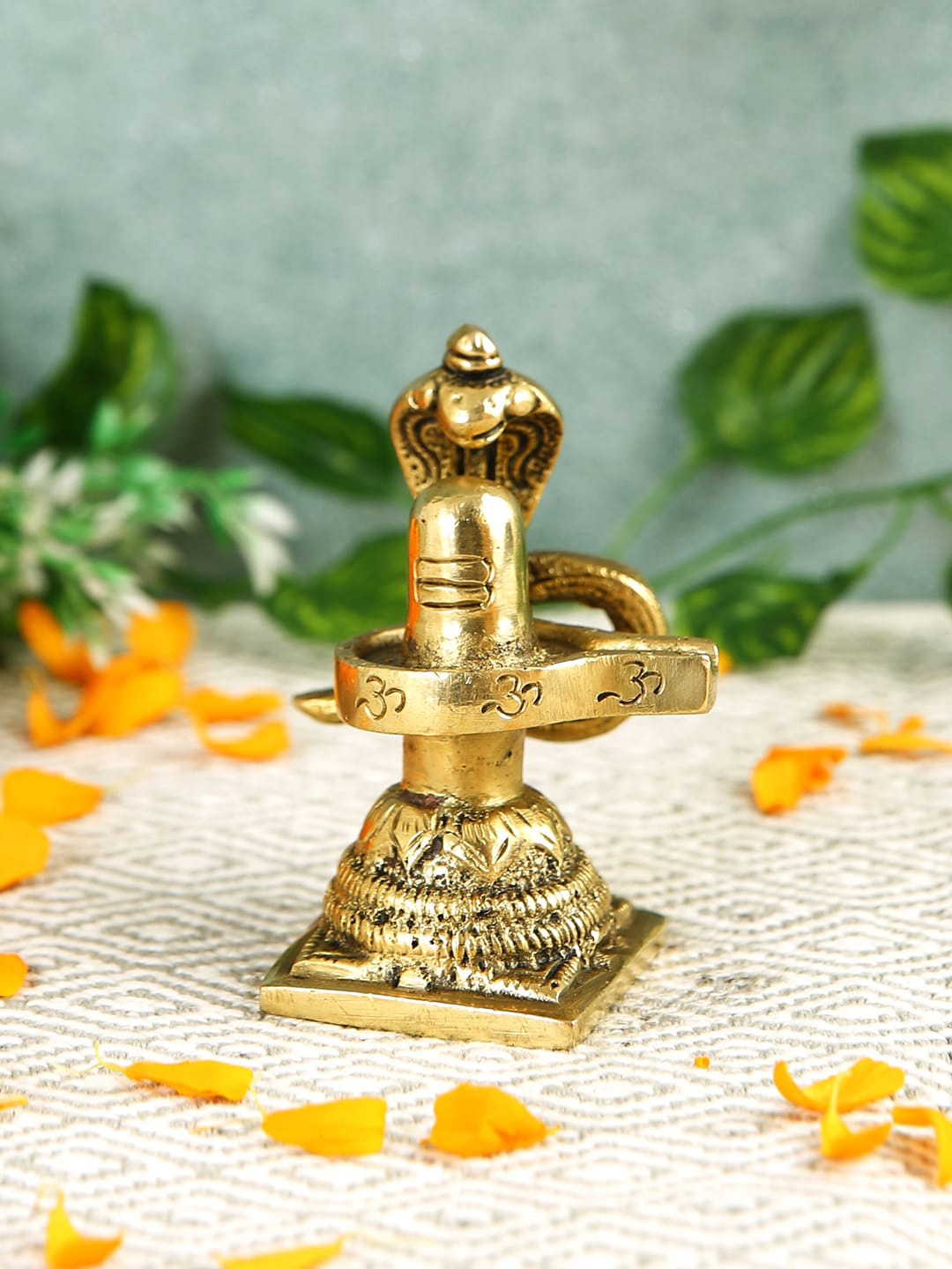 

Imli Street Yellow Textured Snake Shivling Brass Idol Showpiece