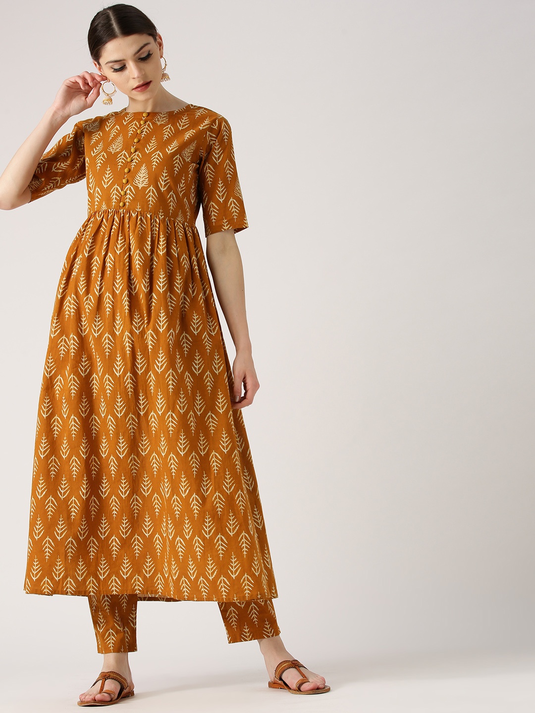 

Libas Women Mustard Yellow & Beige Printed A-Line Kurta with Trousers