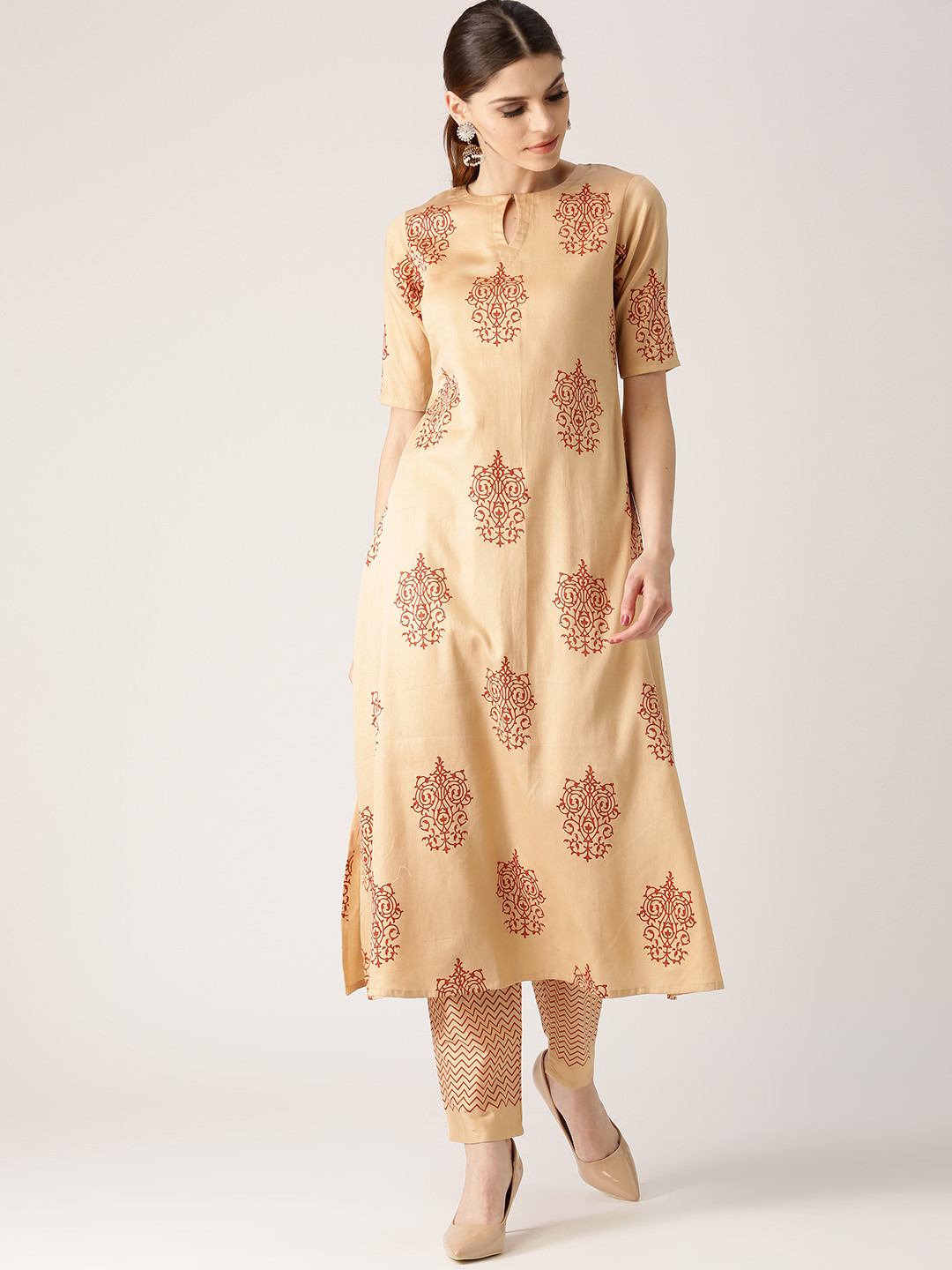 

Libas Women Beige Printed Kurta with Trousers