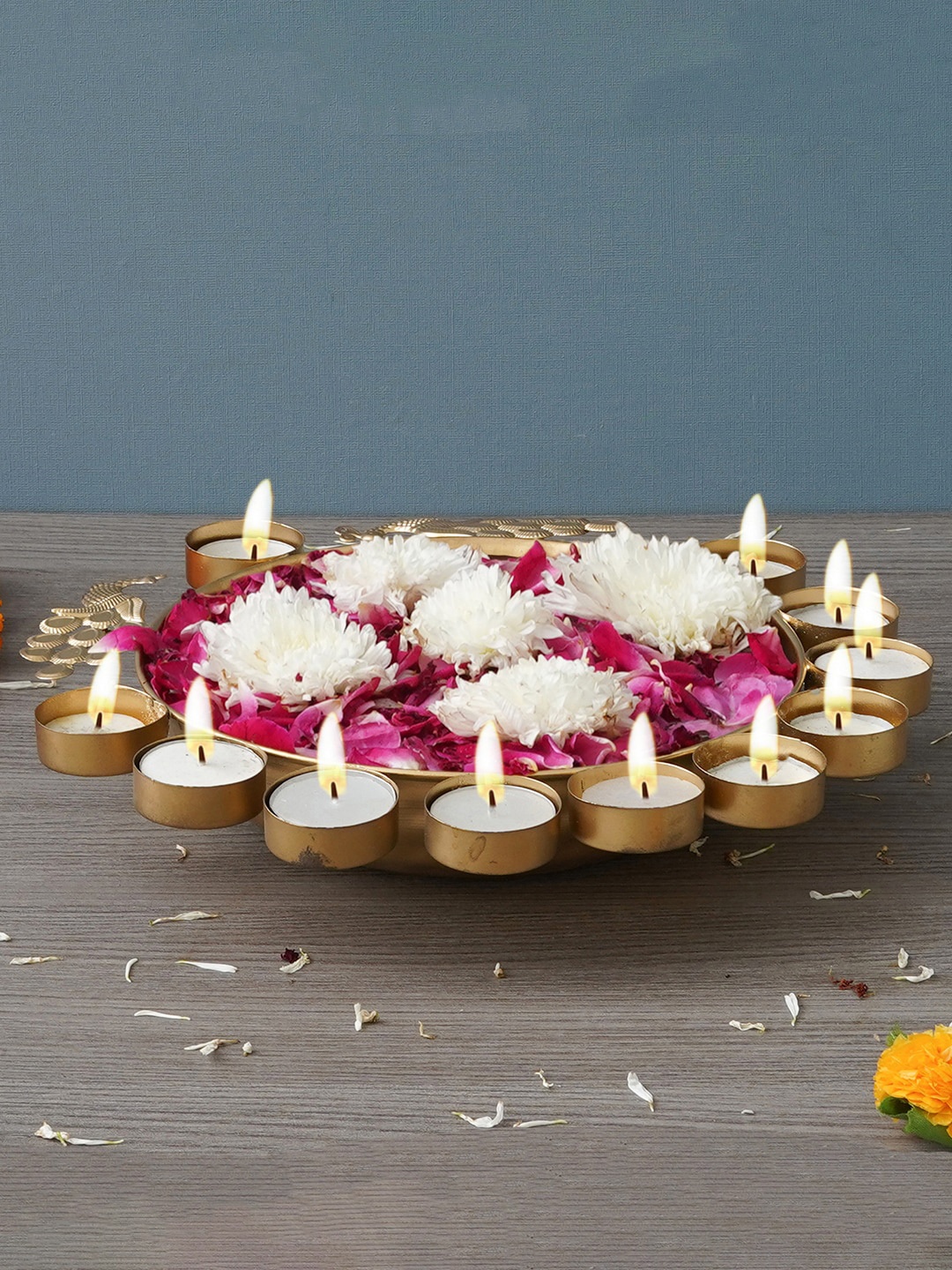 

eCraftIndia Yellow Traditional Peacock Designer Urli With 11 Tea Light Holders