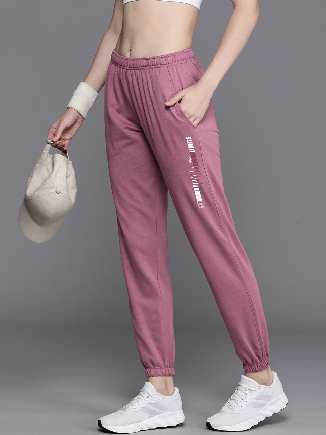 

HRX by Hrithik Roshan Women Minimal Printed Antimicrobial Training Joggers, Mauve