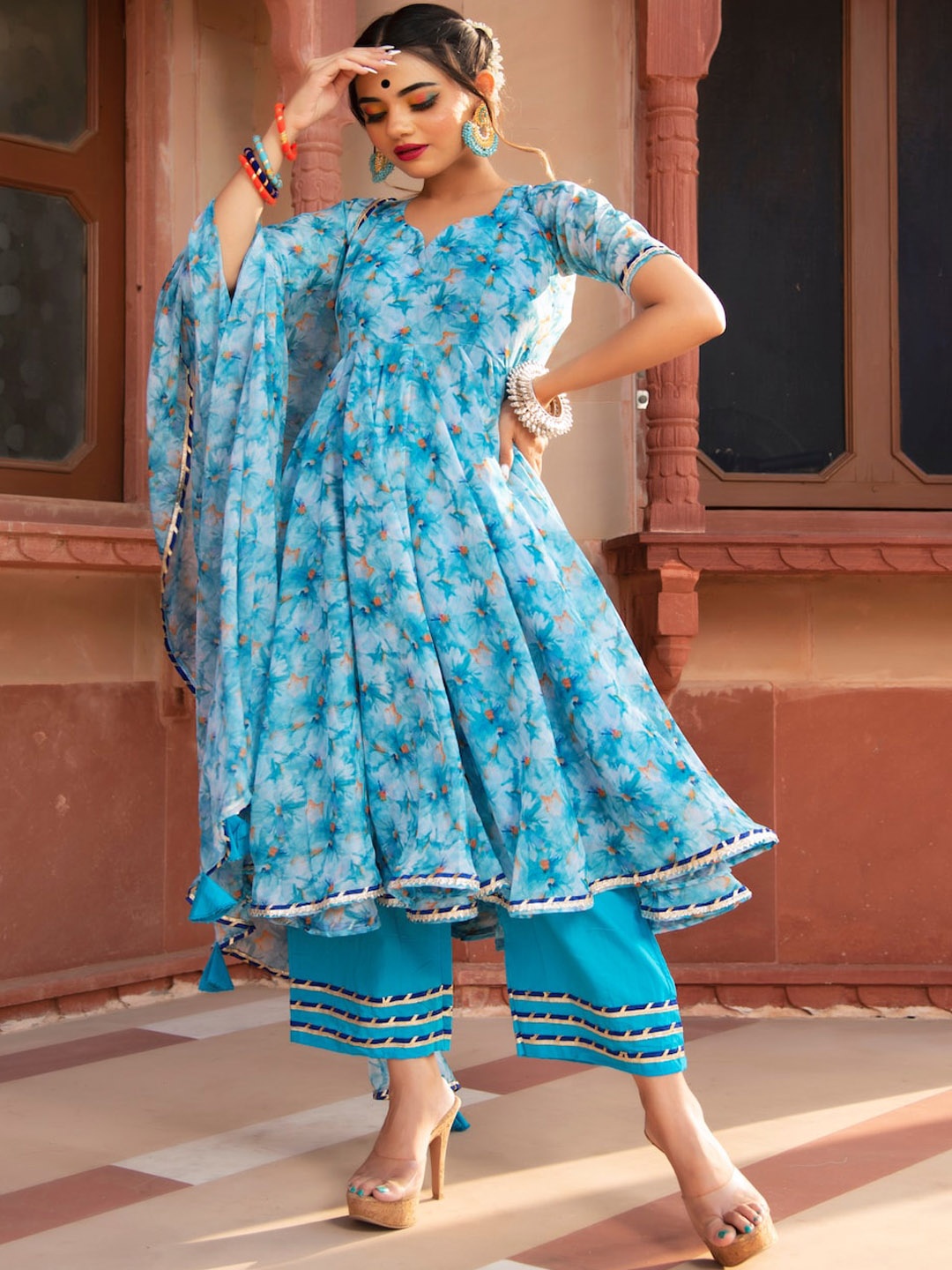 

Pomcha Floral Printed Sweetheart Neck Pleated Anarkali Kurta With Trouser & Dupatta, Blue