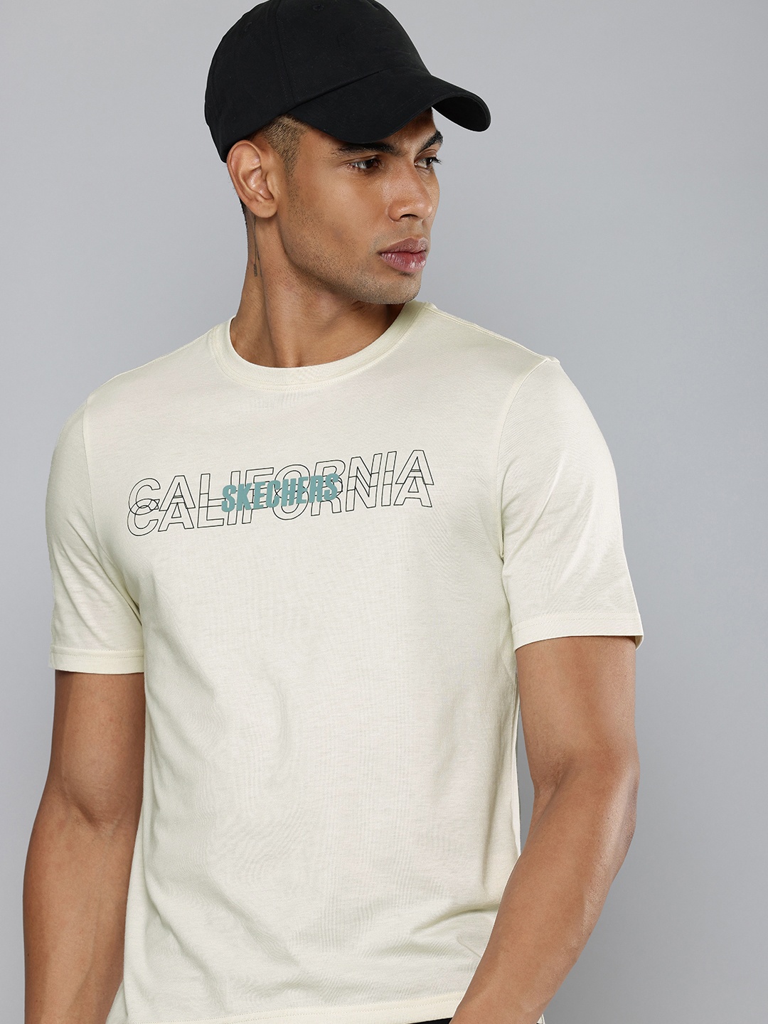 

Skechers Typography Printed Comfort Fit Casual T-shirt, Cream