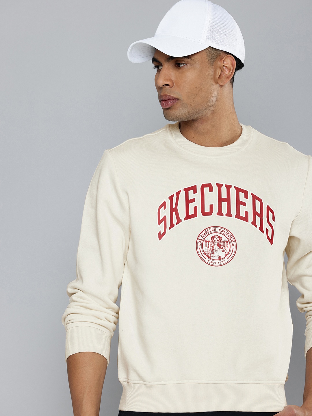 

Skechers SKECHSWEATS DELTA CR Printed Sweatshirt, Beige