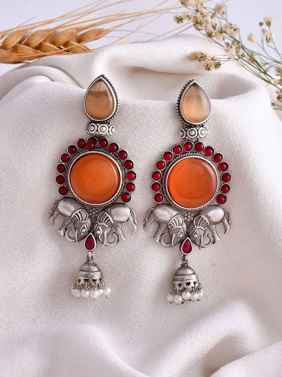 

DASTOOR Silver-Toned Contemporary Jhumkas Earrings