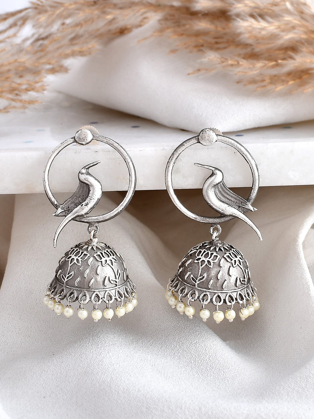 

DASTOOR Silver-Toned Contemporary Jhumkas Earrings