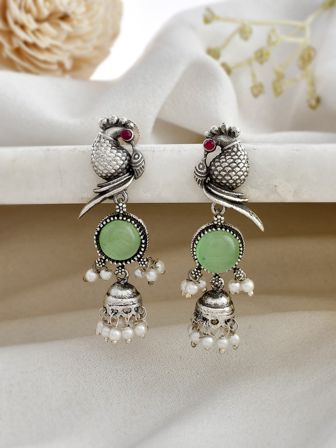 

DASTOOR Silver-Plated Dome Shaped Jhumkas