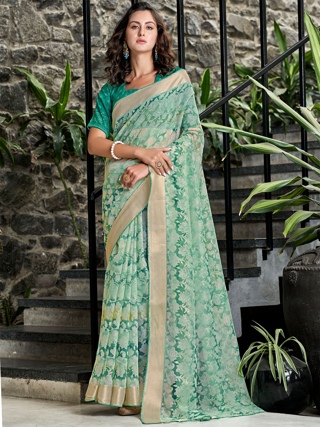 

SANSKAR Green & Gold-Toned Floral Net Saree