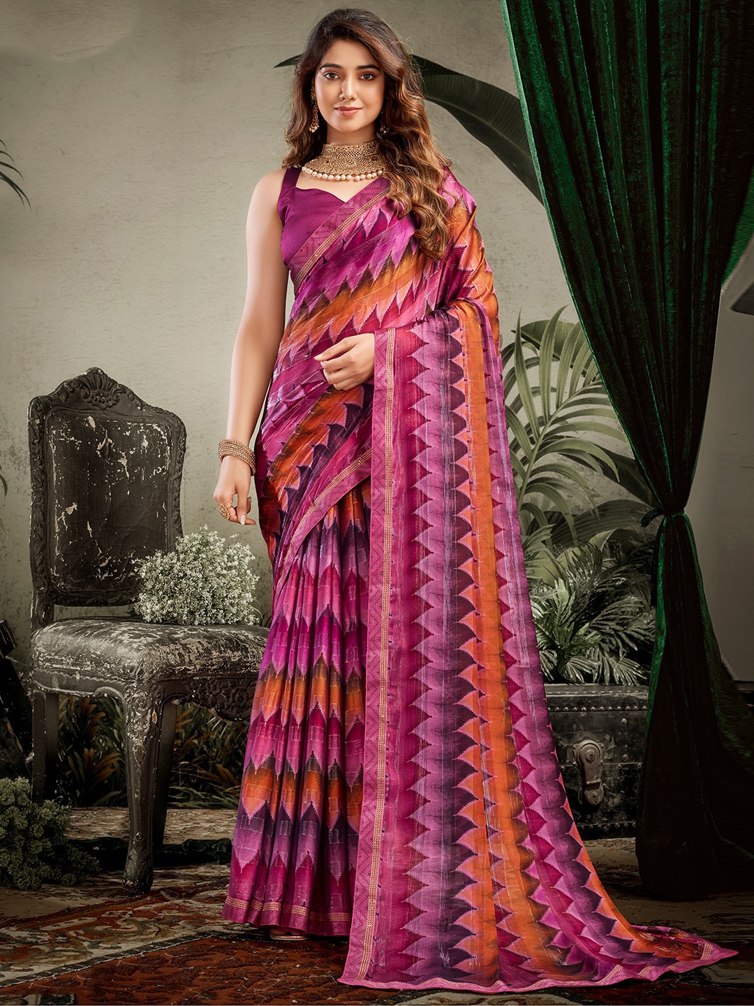 

SANSKAR Pink & Orange Ethnic Motifs Ikat Saree