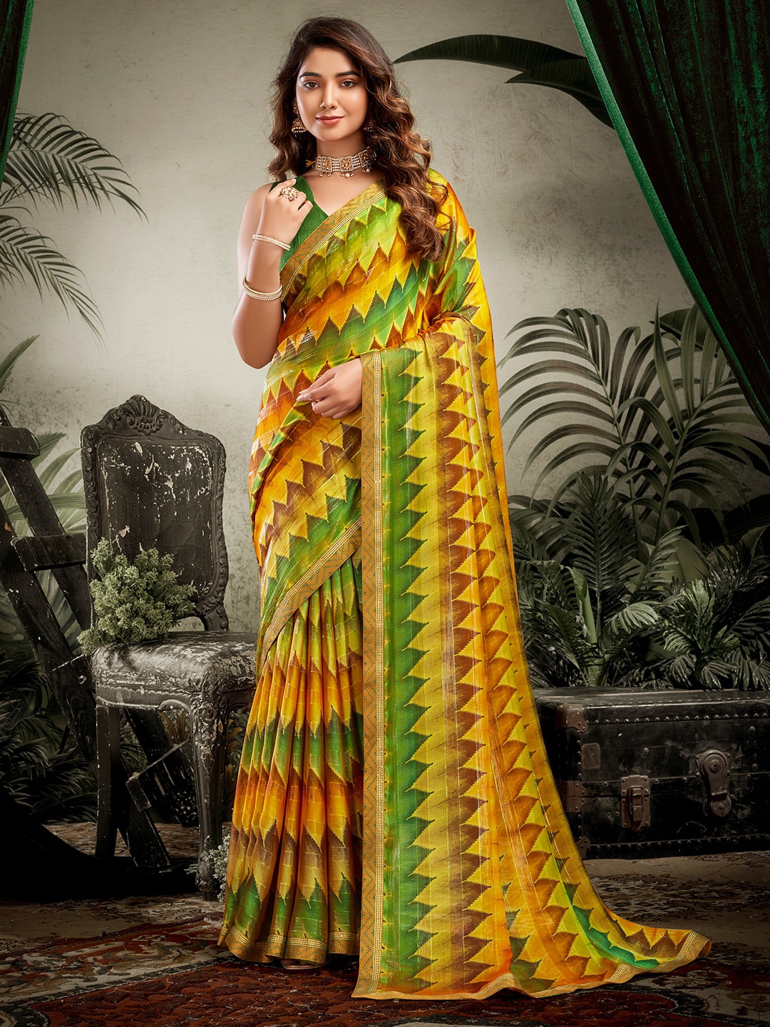 

SANSKAR Yellow & Green Ethnic Motifs Ikat Saree