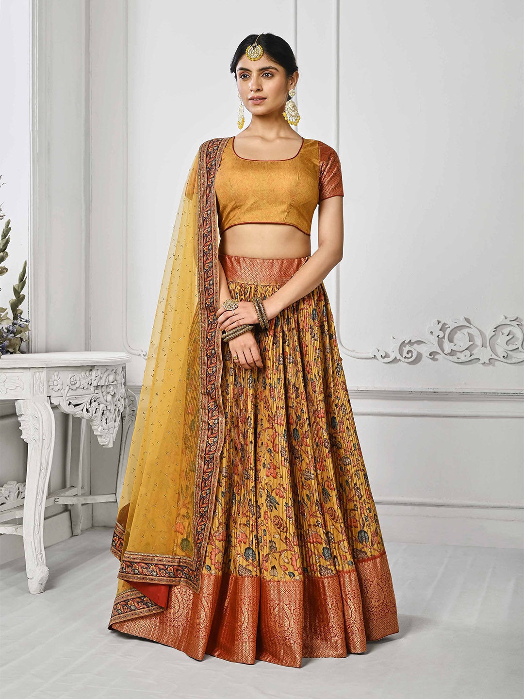 

SAPTRANGI Yellow & Brown Semi-Stitched Lehenga & Unstitched Blouse With Dupatta