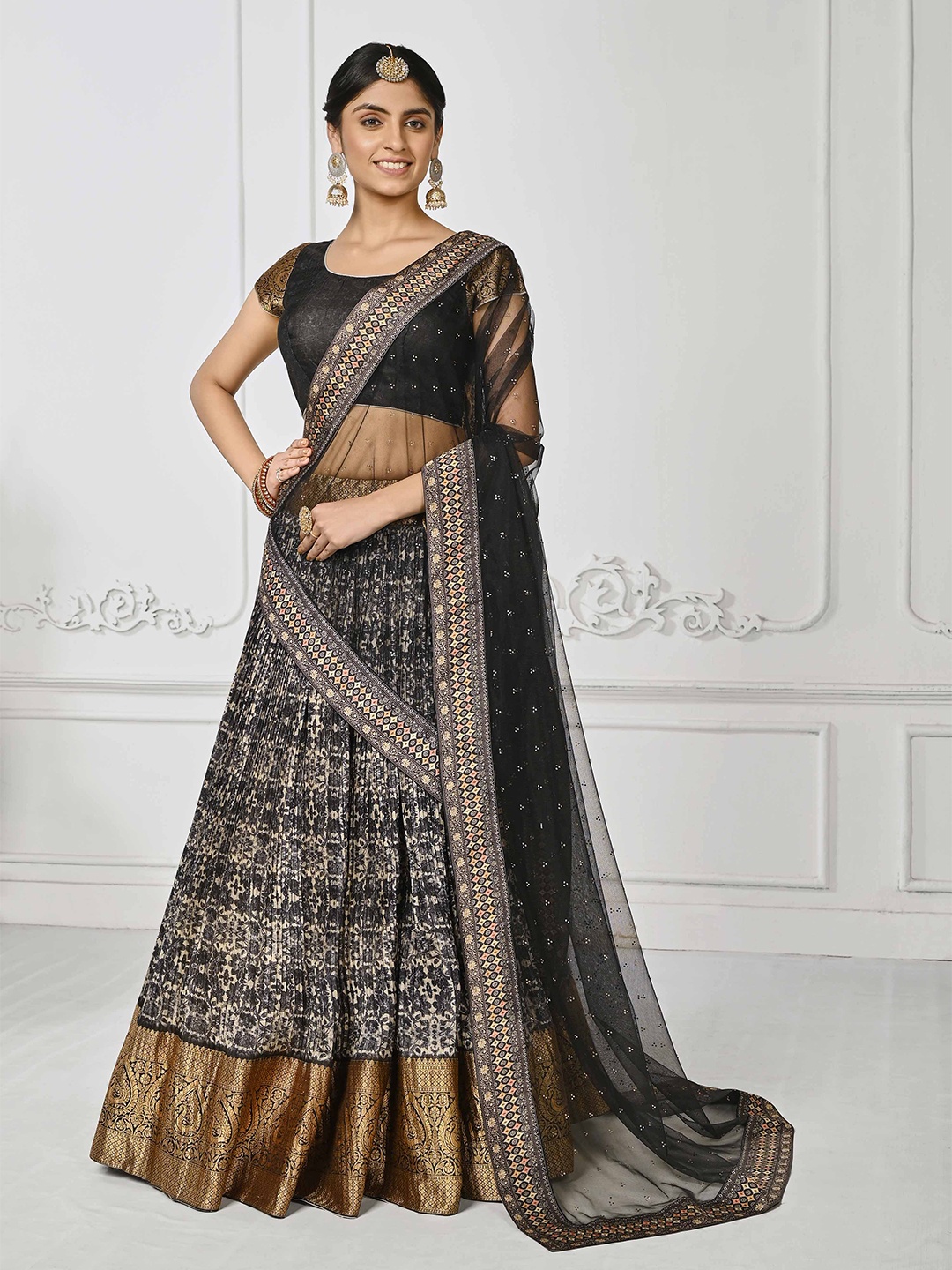 

SAPTRANGI Black & Gold-Toned Printed Semi-Stitched Lehenga & Unstitched Blouse With Dupatta