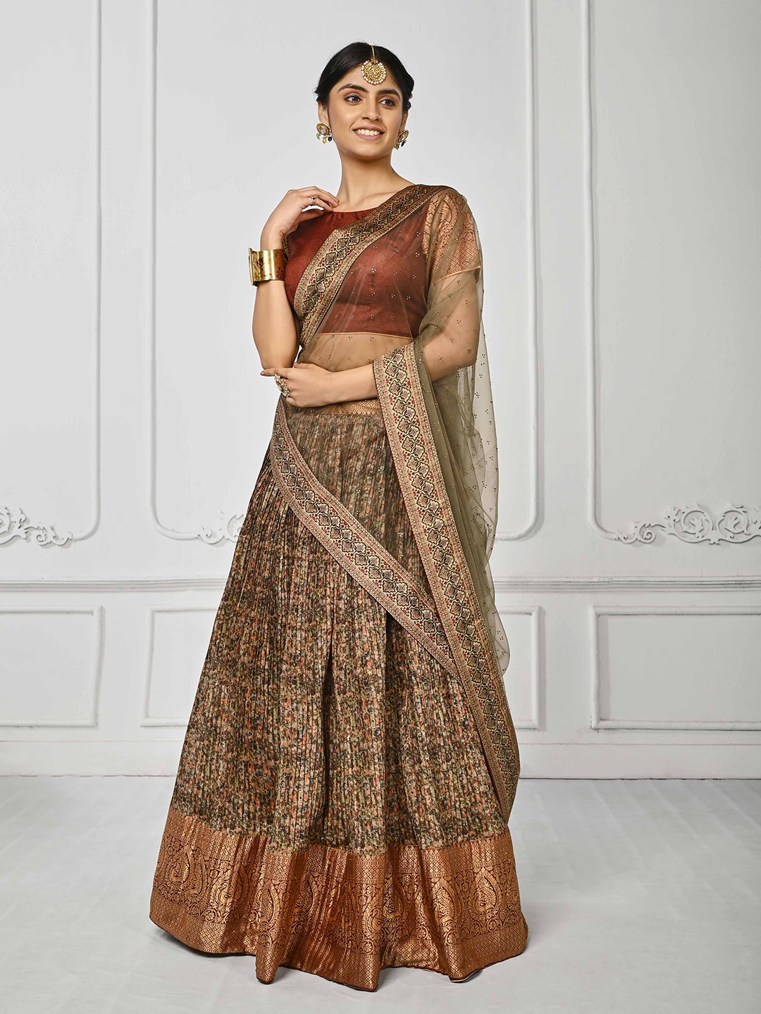 

SAPTRANGI Ethnic Motifs Printed Zari Semi-Stitched Lehenga Choli, Olive