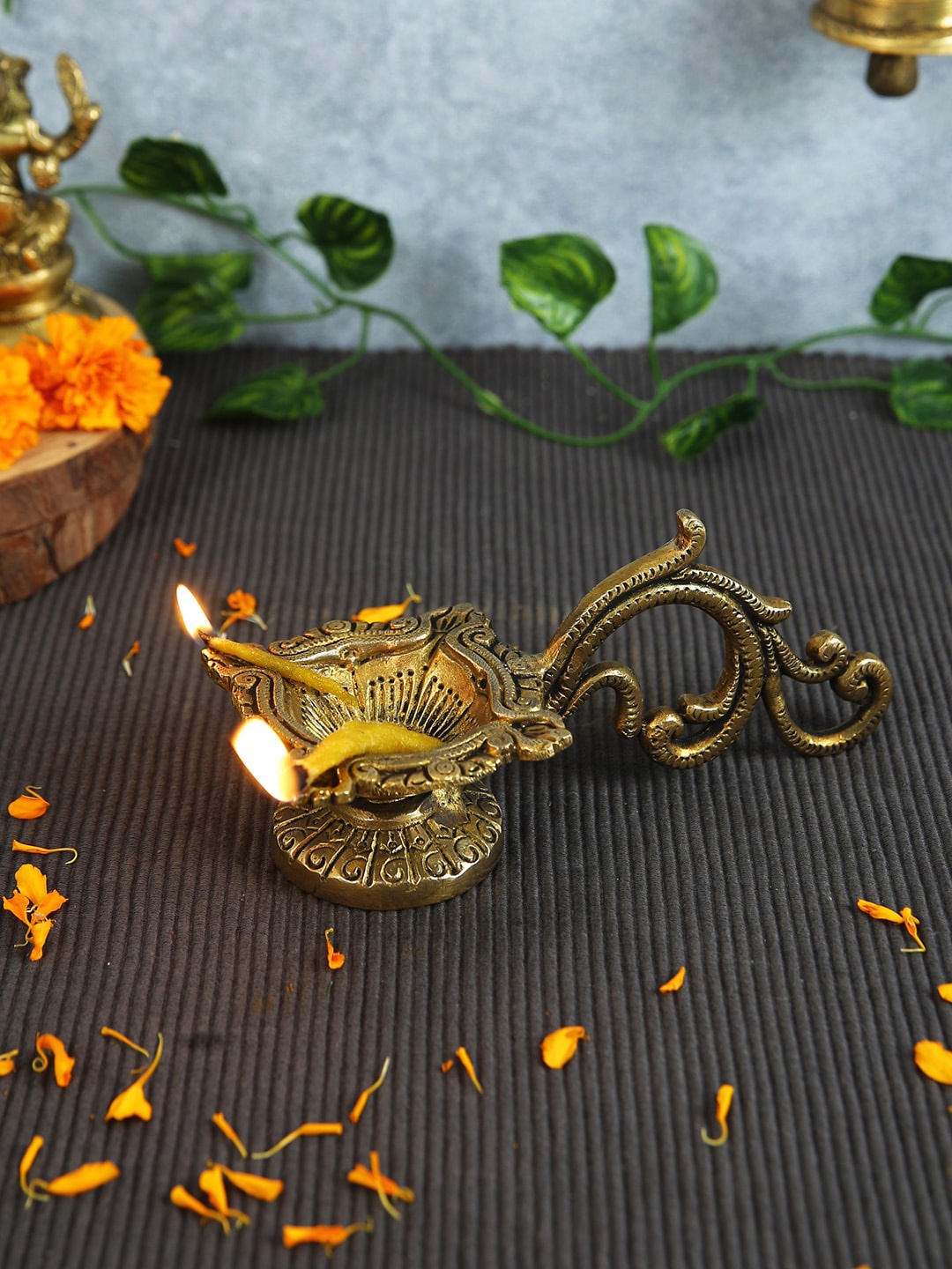 

Imli Street Gold Toned Metallic Brass Diya With Handle