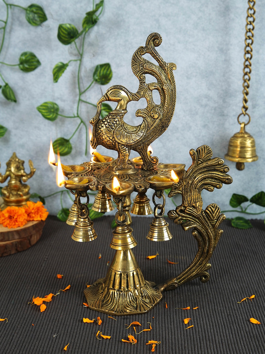 

Imli Street Gold Metallic Big Peacock Design Brass Diya Lamp