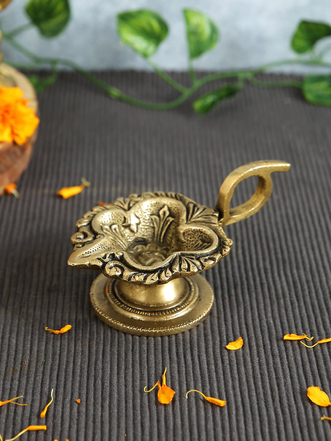 

Imli Street Gold Toned Swastik Brass Aarti Deepak
