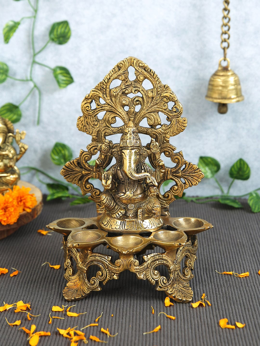 

Imli Street Gold Toned Ganesh Carving Brass Diyas