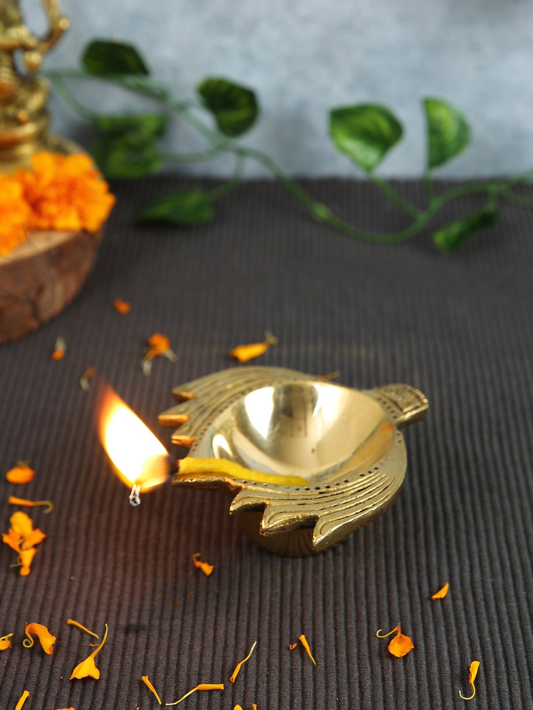 

Imli Street Gold Toned Lotus Designed Brass Diya