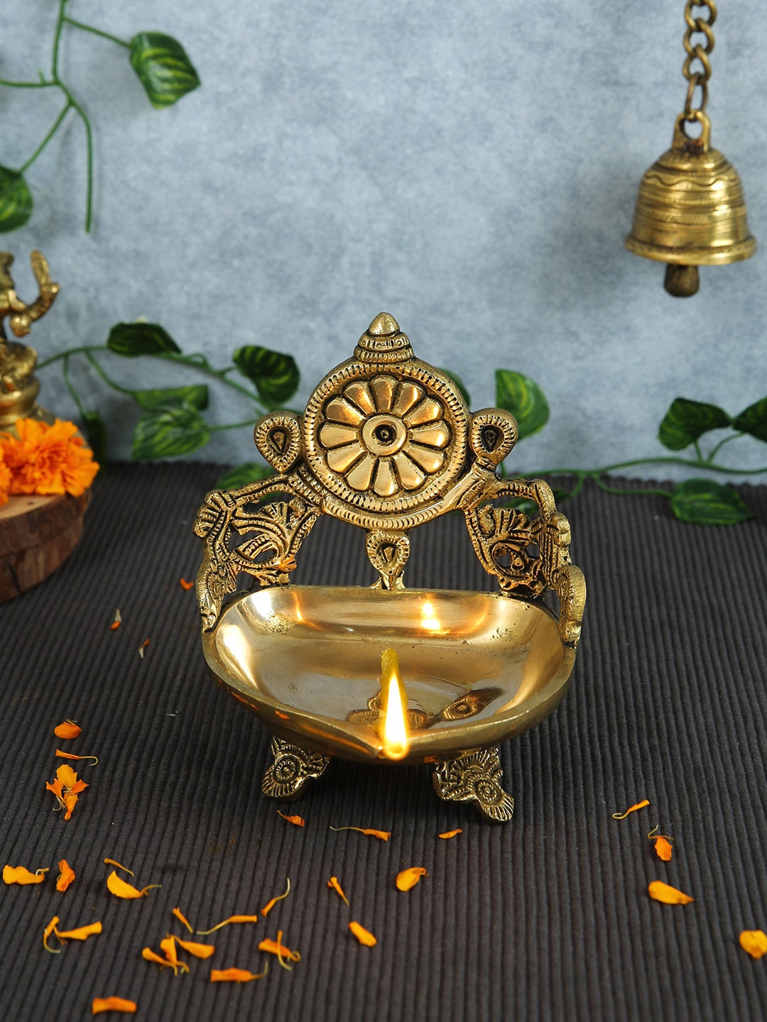 

Imli Street Gold Toned Brass Chakra Diya