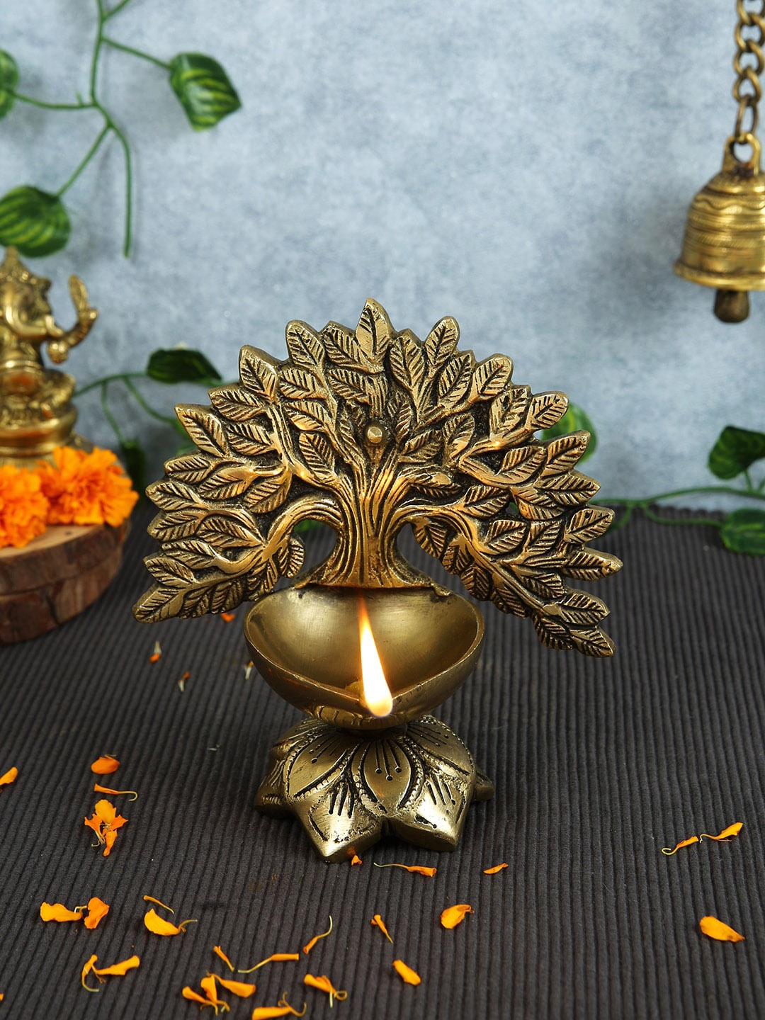 

Imli Street Gold Toned Leaf Tree Design Brass Deepak