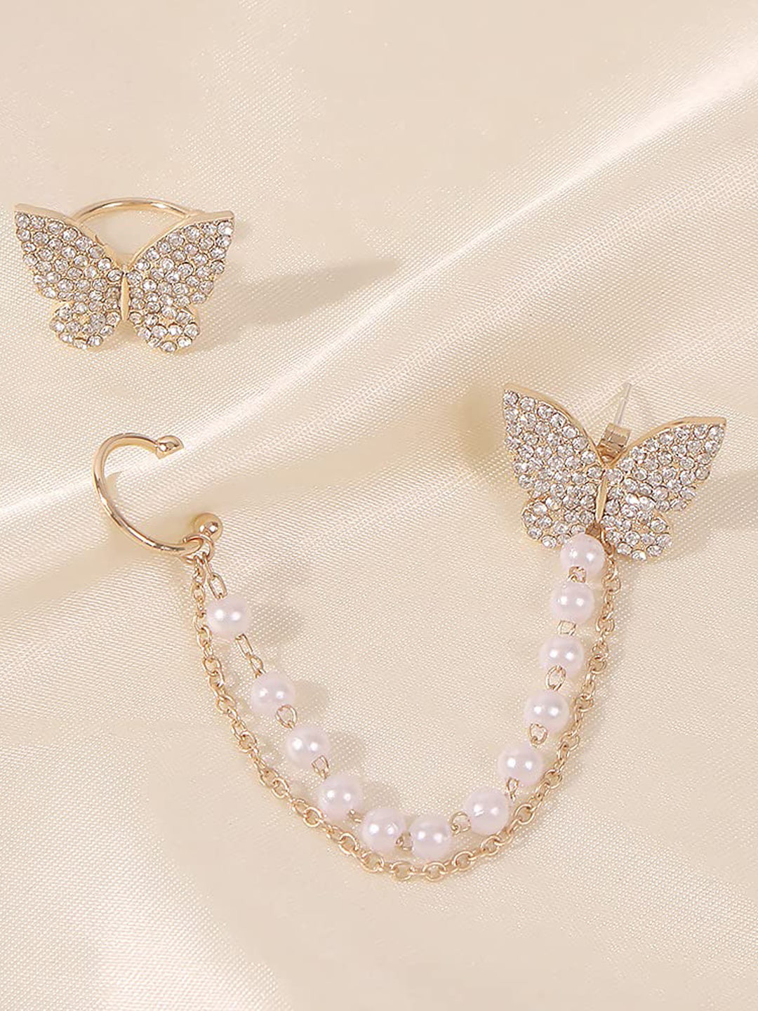 

VAGHBHATT Gold Plated Butterfly Stone Studded Earring With Beaded Chain & Ear Cuff