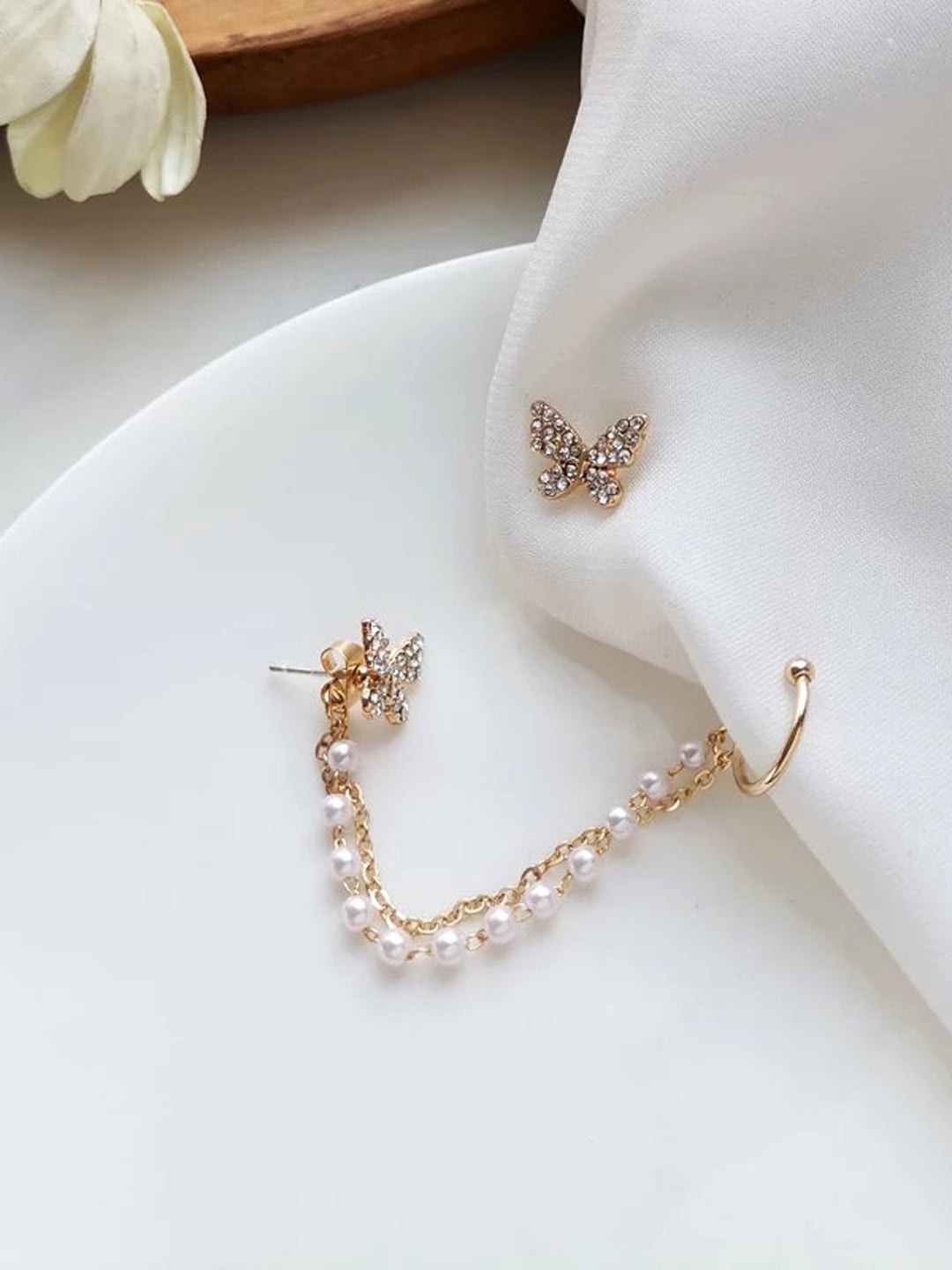 

VAGHBHATT Gold Plated Classic Butterfly Stone Studded Pearl Chain Ear Cuff Earrings