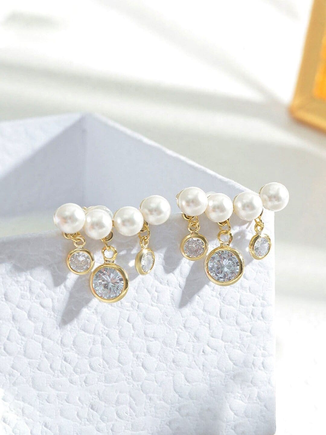 

DressBerry Gold-Plated Brass Contemporary Studs Earrings