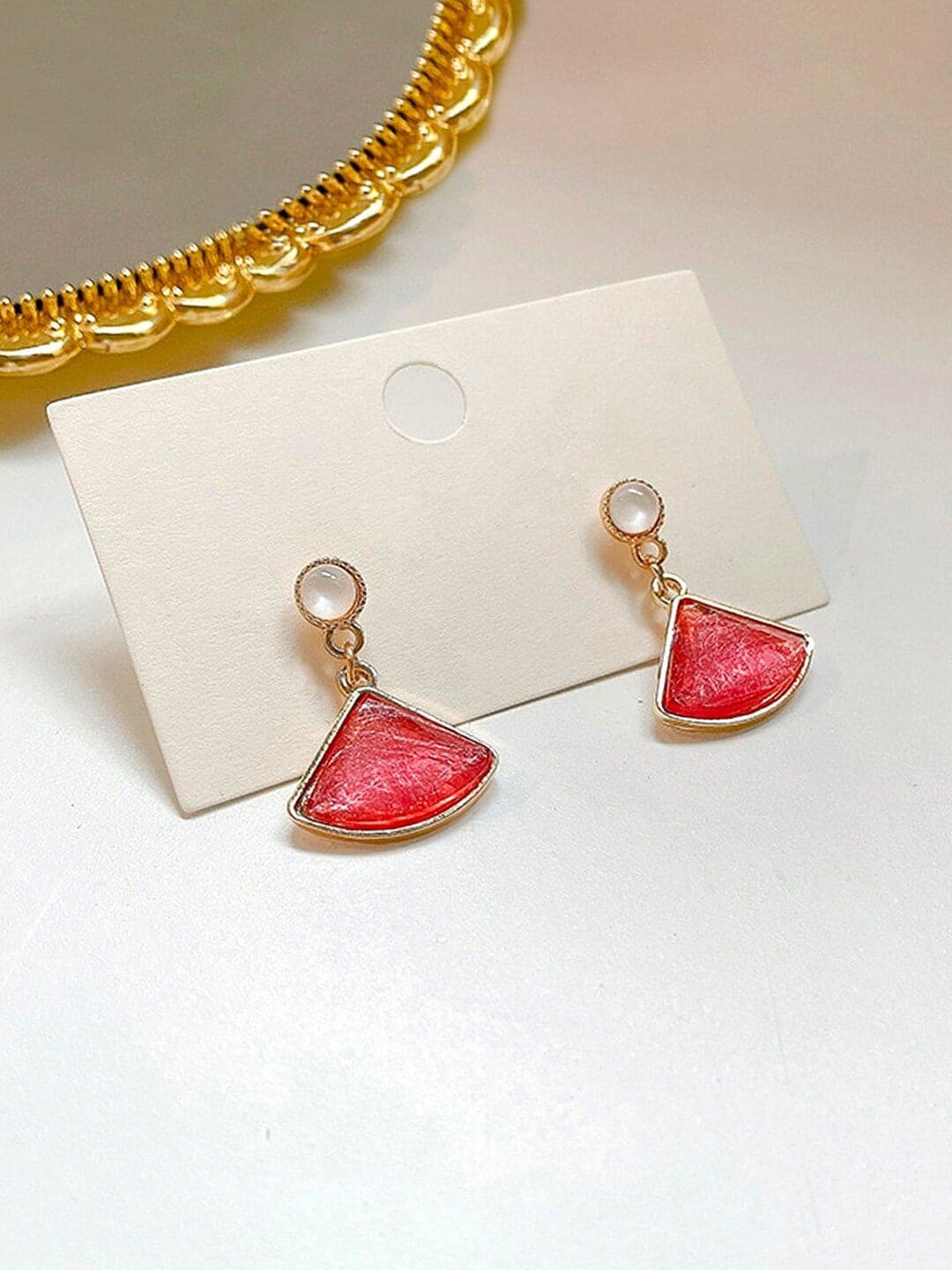 

DressBerry Pink Gold-Plated Triangular Crystal-Studded Drop Earrings