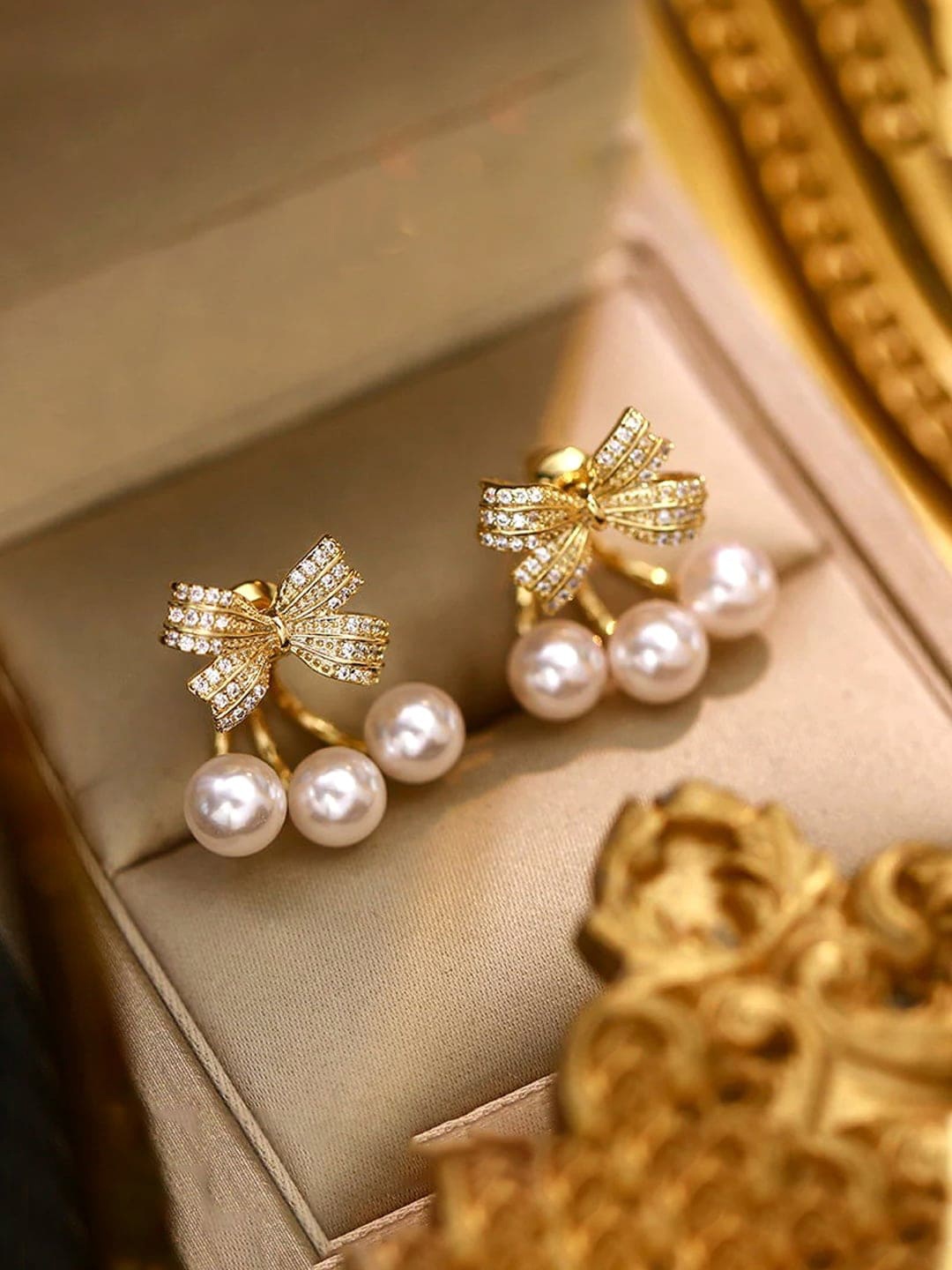 

DressBerry Gold-Toned Gold-Plated Crystal Studded & Beaded Contemporary Studs