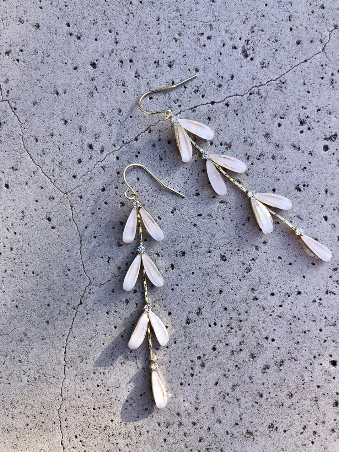 

DressBerry White Artificial Stones-Studded Drop Earrings