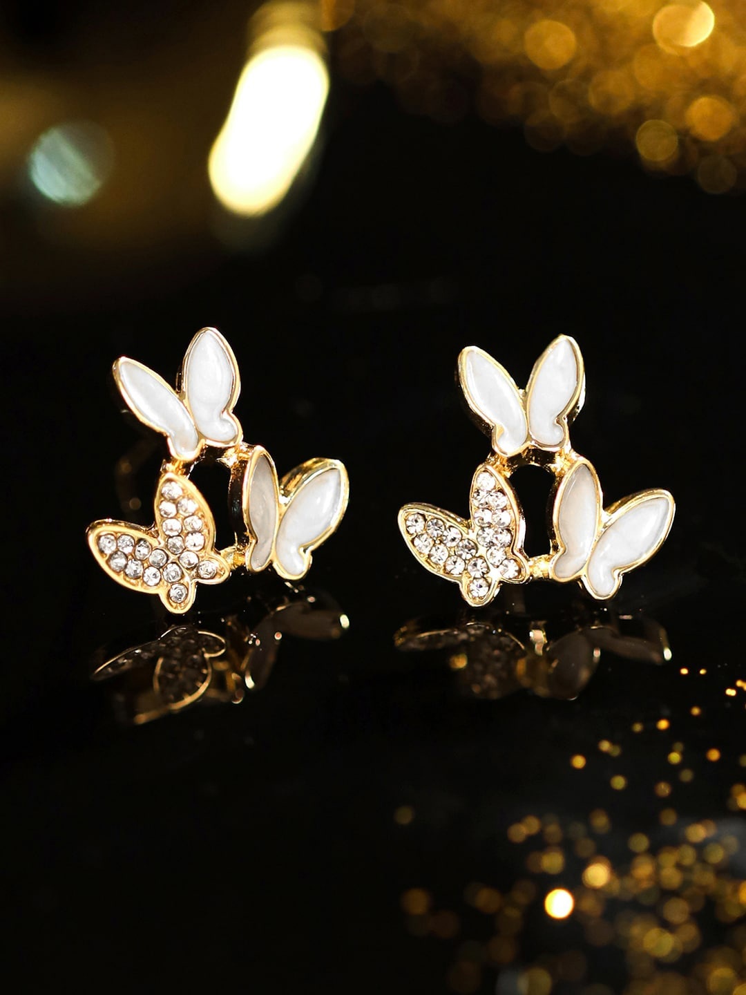 

DressBerry Gold-Plated Contemporary Studs Earrings