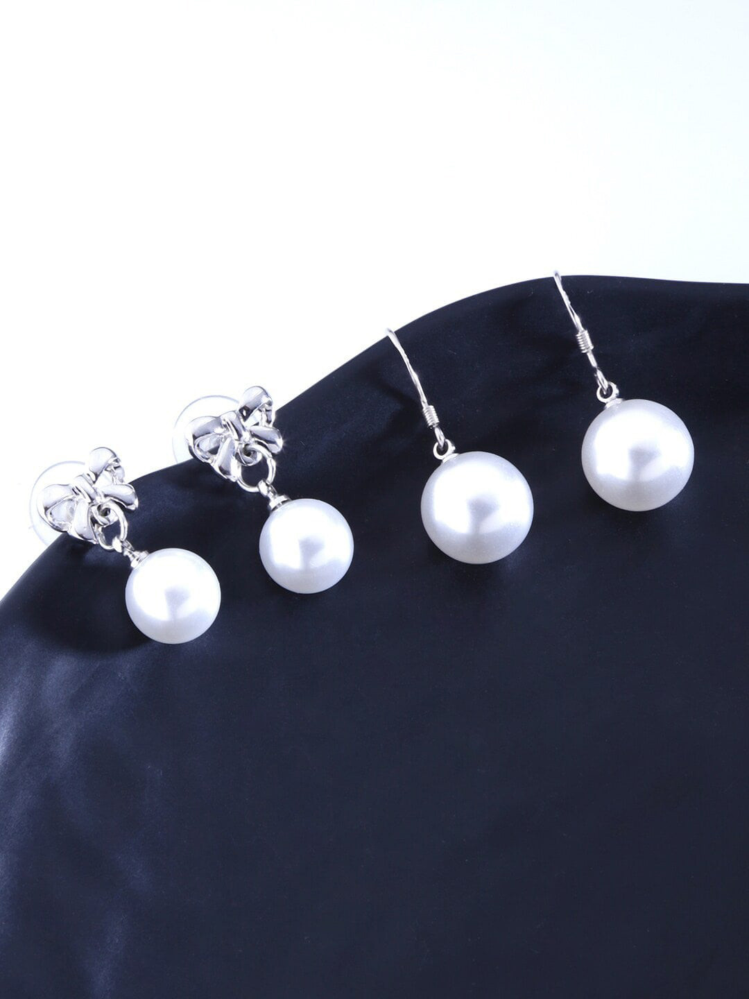 

DressBerry Set Of 2 Silver Plated Pearl Studded Drop Earrings