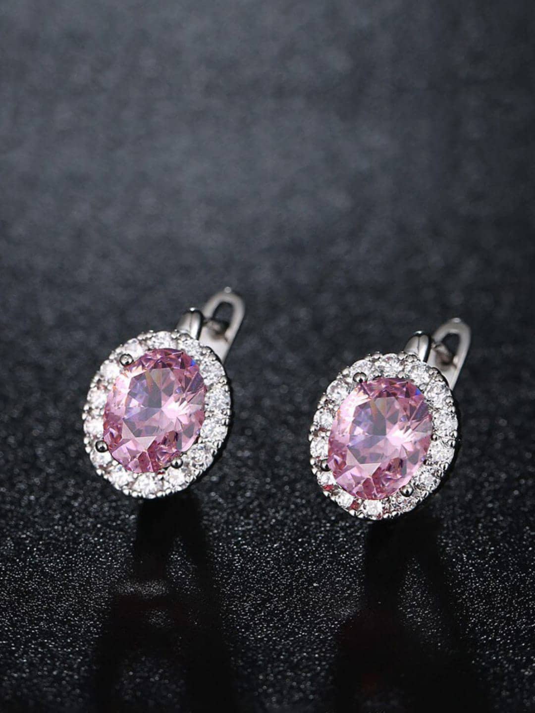 

DressBerry Silver-Plated Oval Studs Earrings