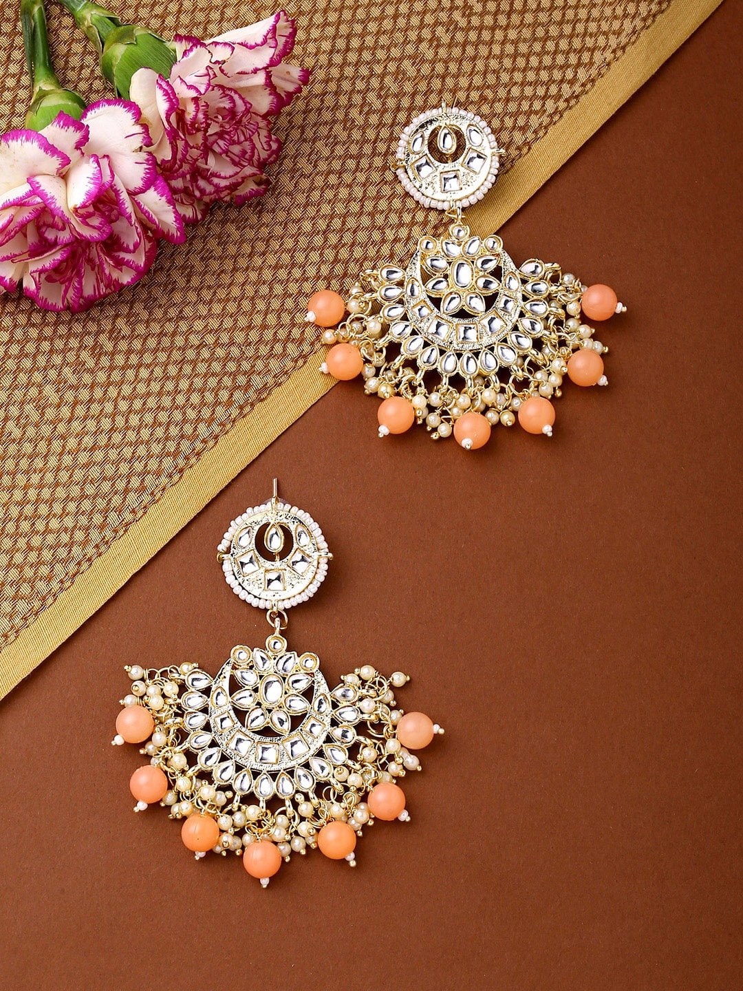 

Anouk Gold-Plated Kundan-Studded Contemporary Chandbalis