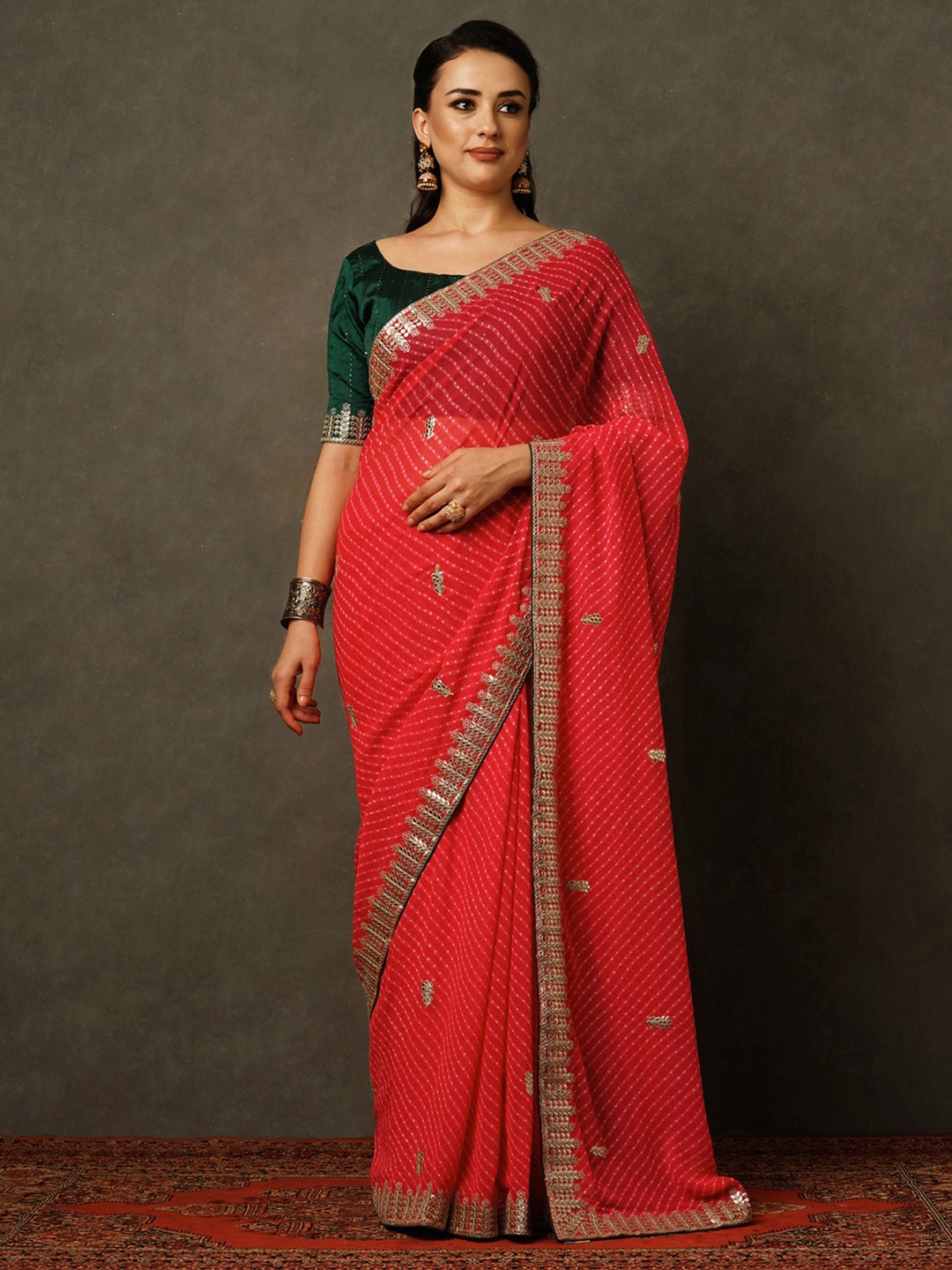 

Mitera Pink Gold-Toned Leheriya Printed Embroidered Poly Georgette Bandhani Saree