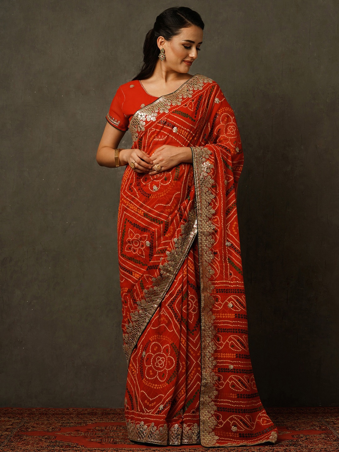 

Mitera Red & Gold-Toned Bandhani Printed Embroidered Pure Georgette Saree