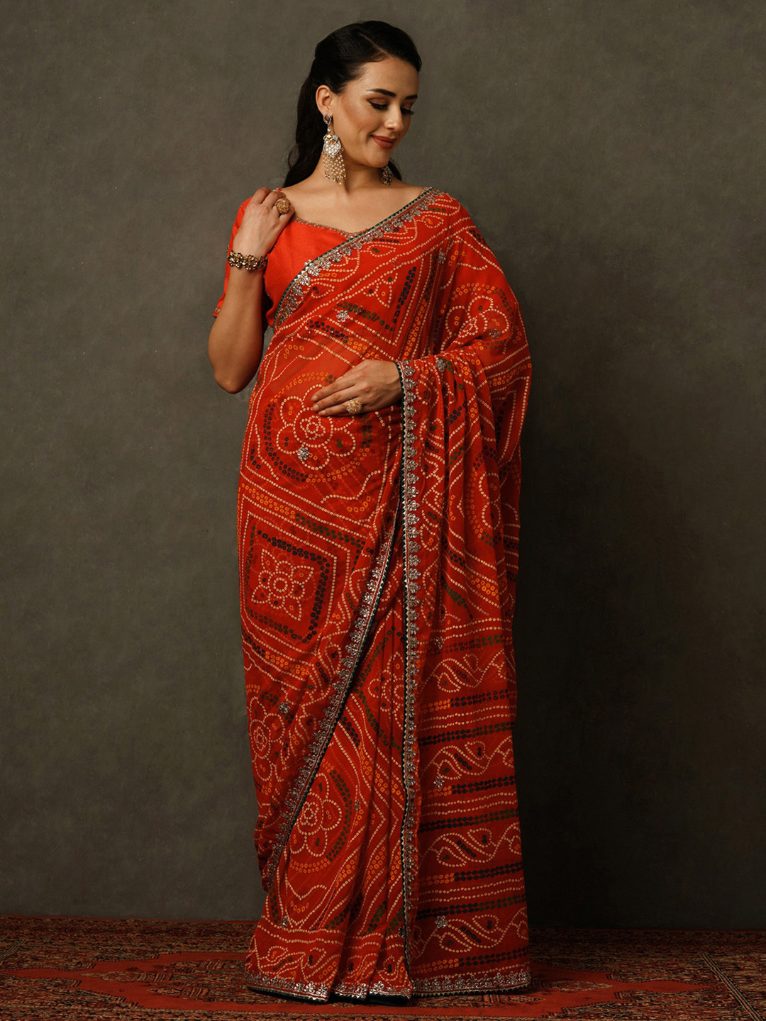 

Mitera Red & Green Bandhani Printed Beads & Stones Poly Georgette Saree