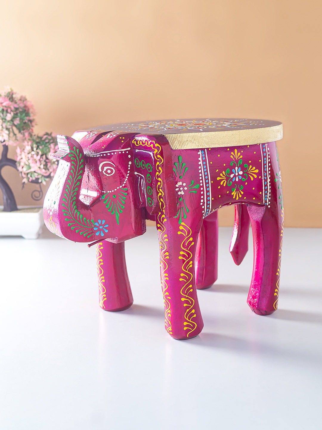

Golden Peacock Pink Elephant Stool Showpiece