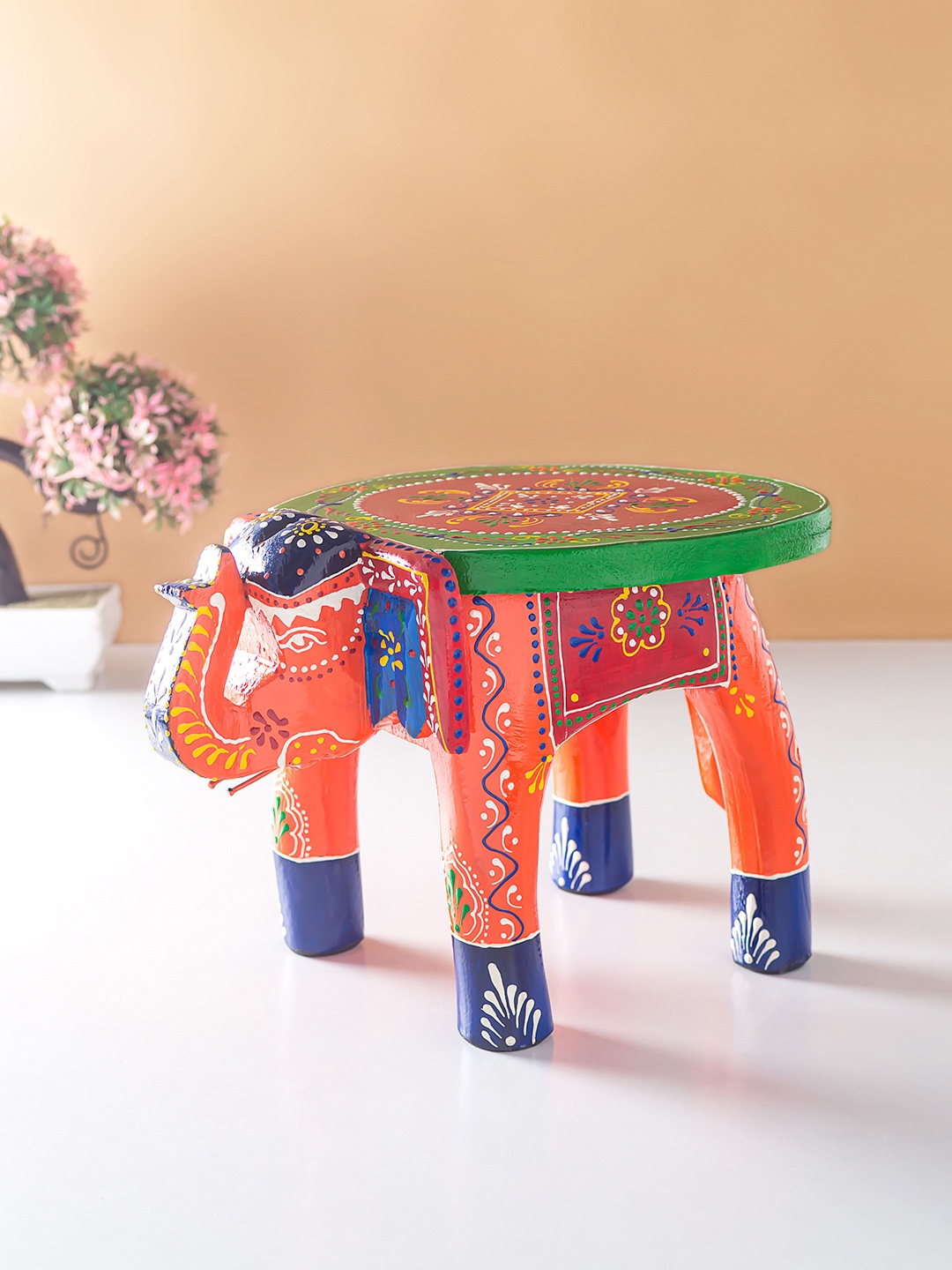 

Golden Peacock Orange & Green Textured Elephant Stool Wooden Figurine Showpiece