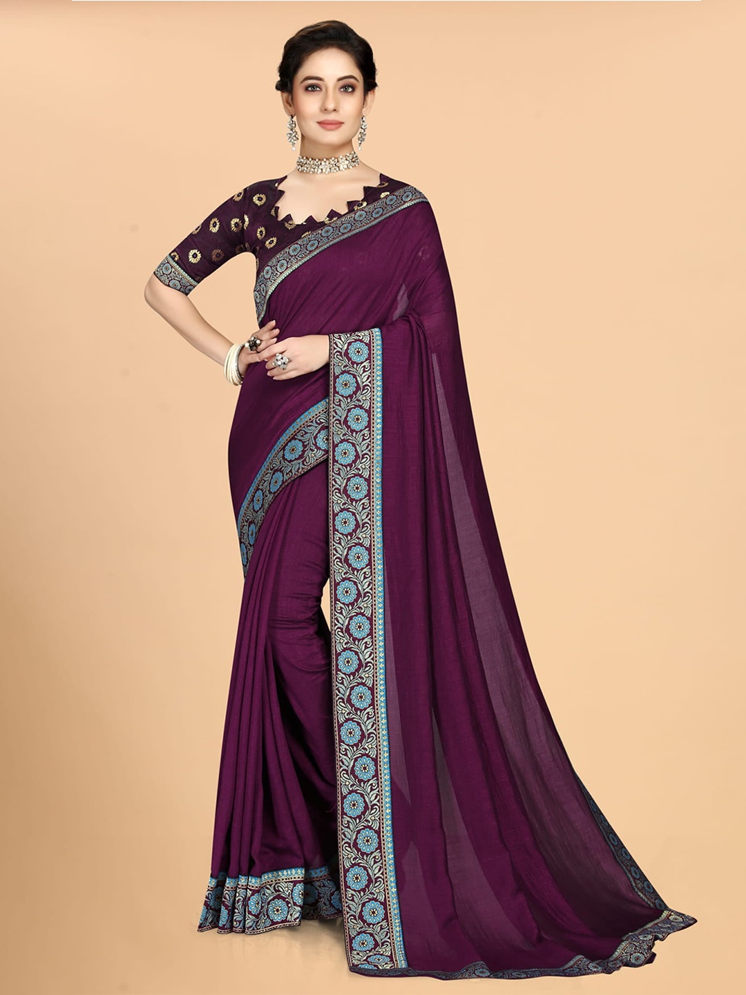 

Mitera Purple & Blue Zari Silk Blend Saree