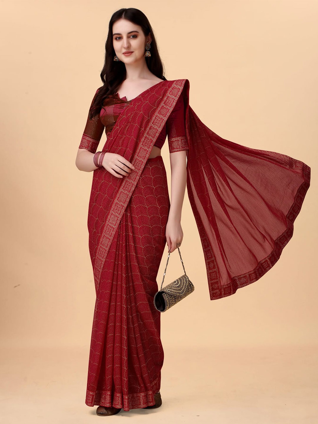 

Mitera Maroon Ethnic Motifs Printed Saree