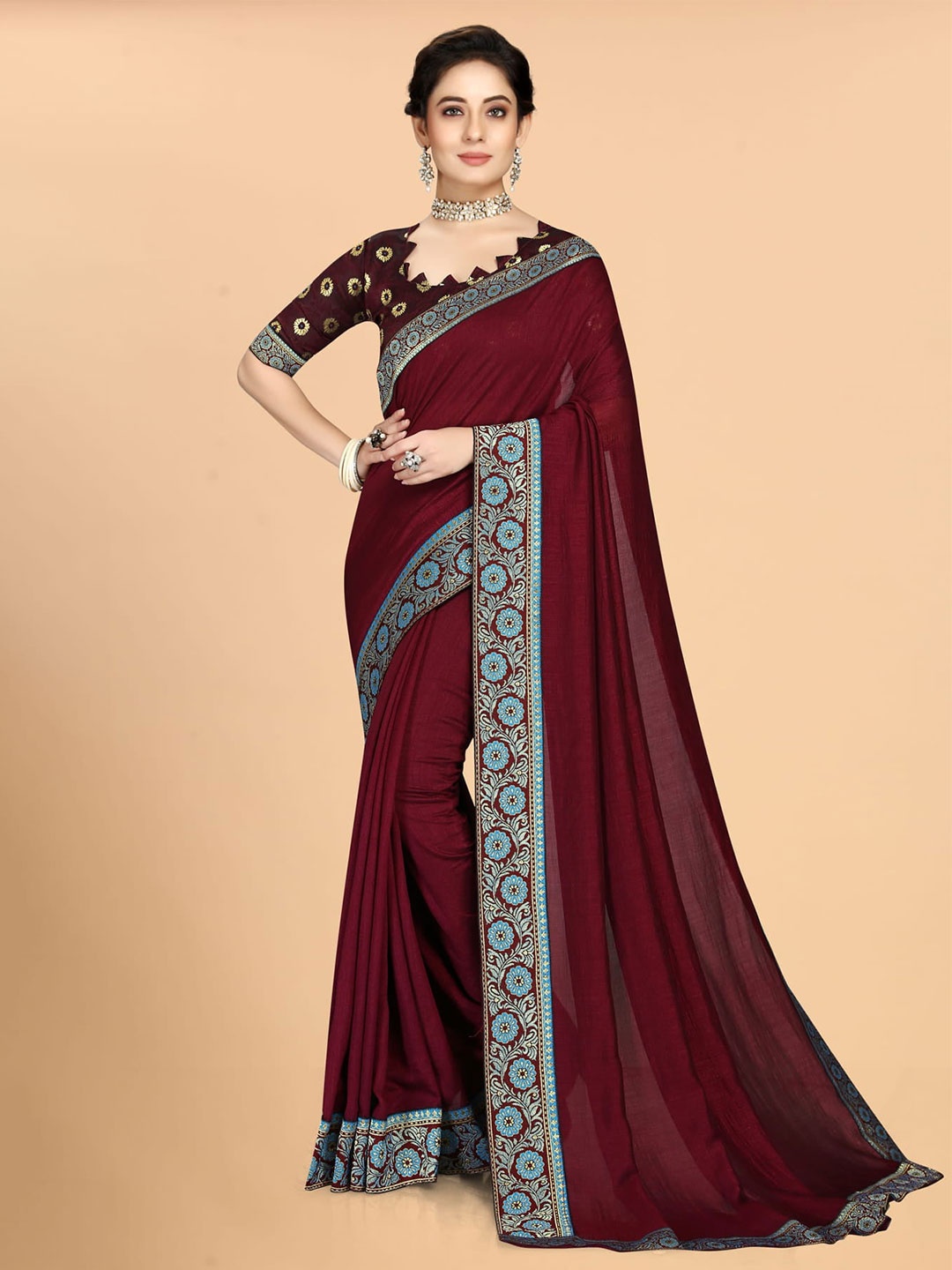 

Mitera Maroon & Blue Woven Design Saree