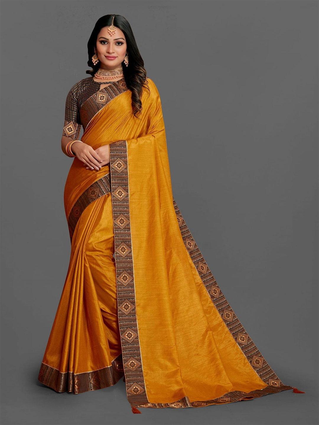 

Mitera Mustard & Brown Silk Blend Saree