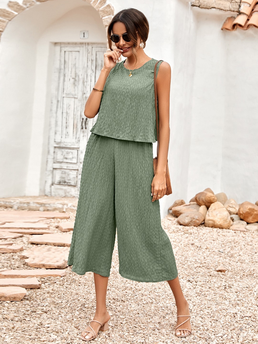 

StyleCast Green Round Neck Self Design Basic Jumpsuit