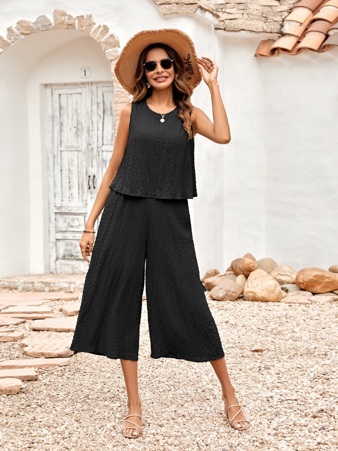 

StyleCast Black Round Neck Self Design Basic Jumpsuit