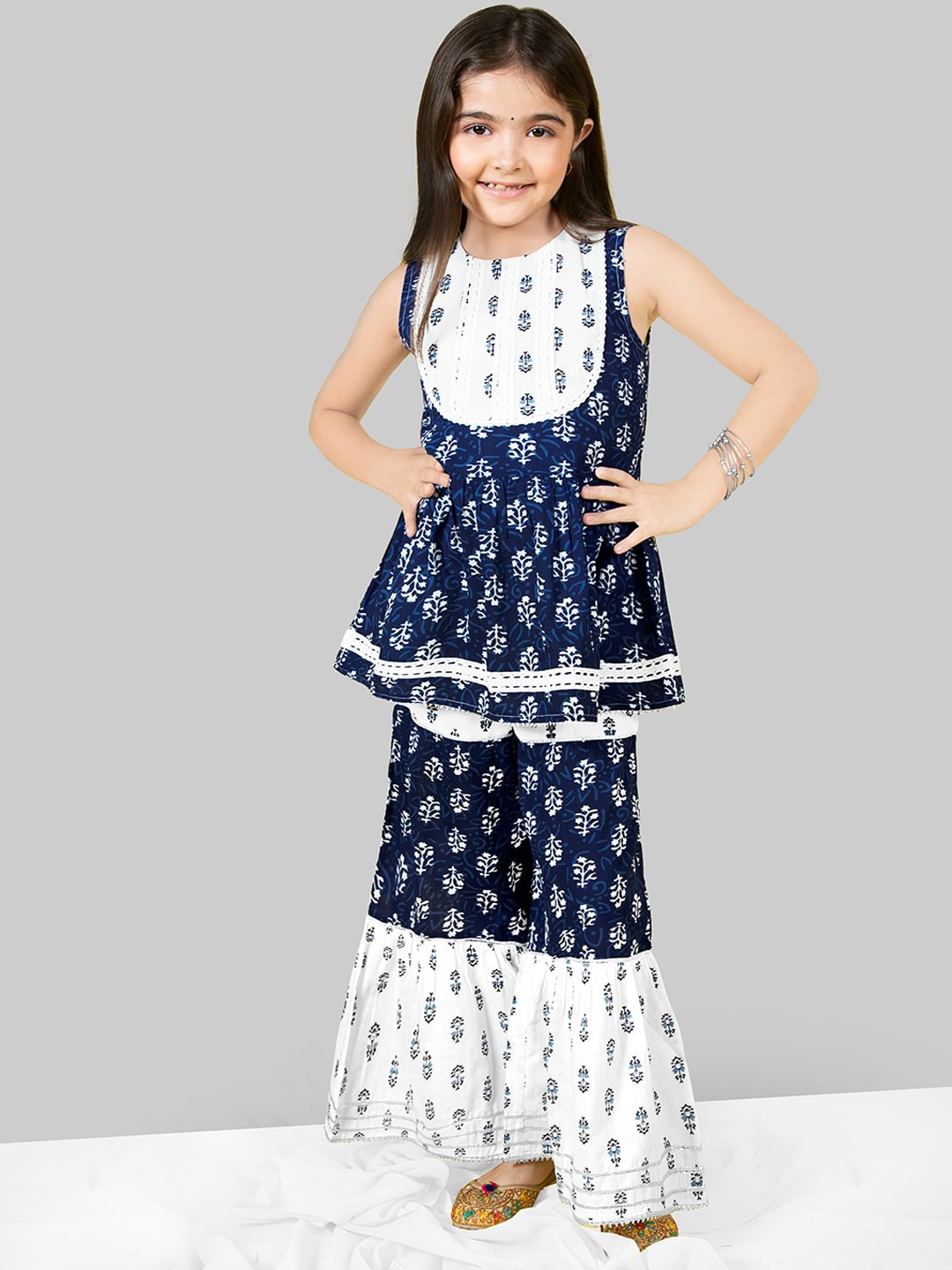 

Naughty Ninos Girls Ethnic Motifs Printed Empire Kurti with Sharara, Navy blue