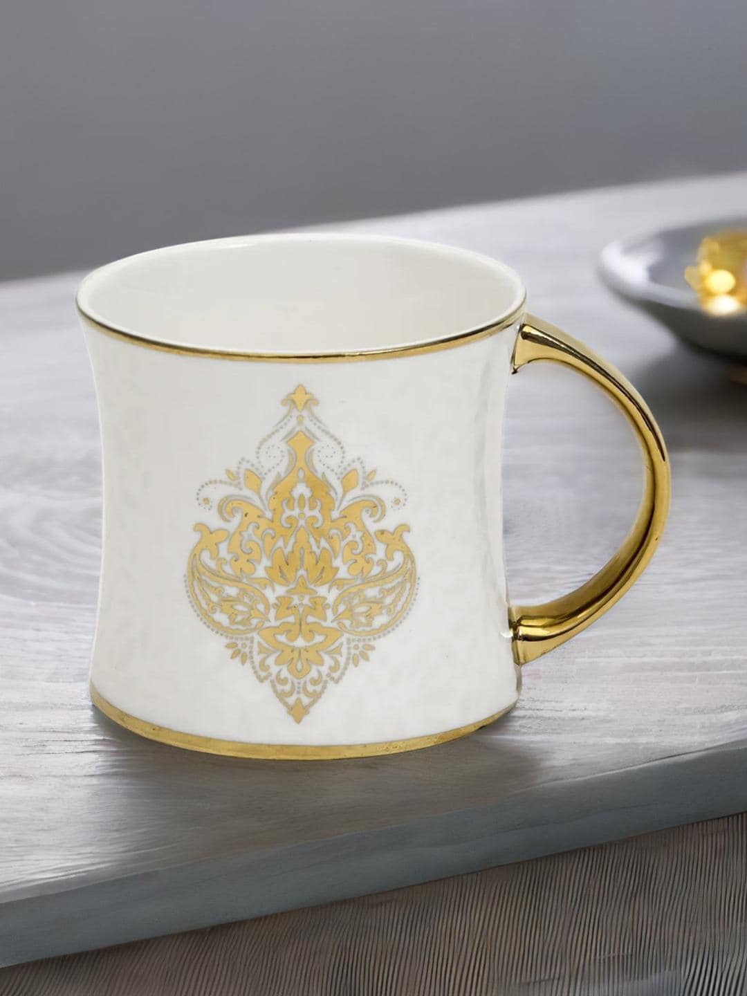 

Athome by Nilkamal White & Gold-Toned 6-Pieces Printed Ceramic Glossy Coffee Mugs 200 ml