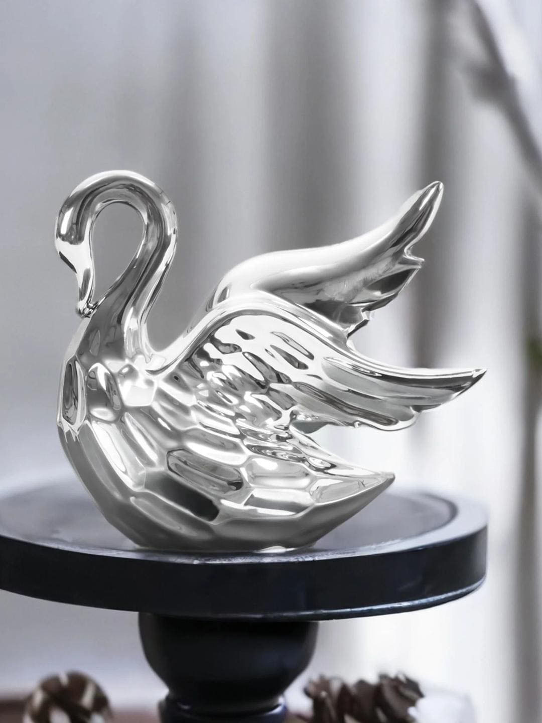 

Athome by Nilkamal Silver Swan Wings Decorative Ceramic Showpiece
