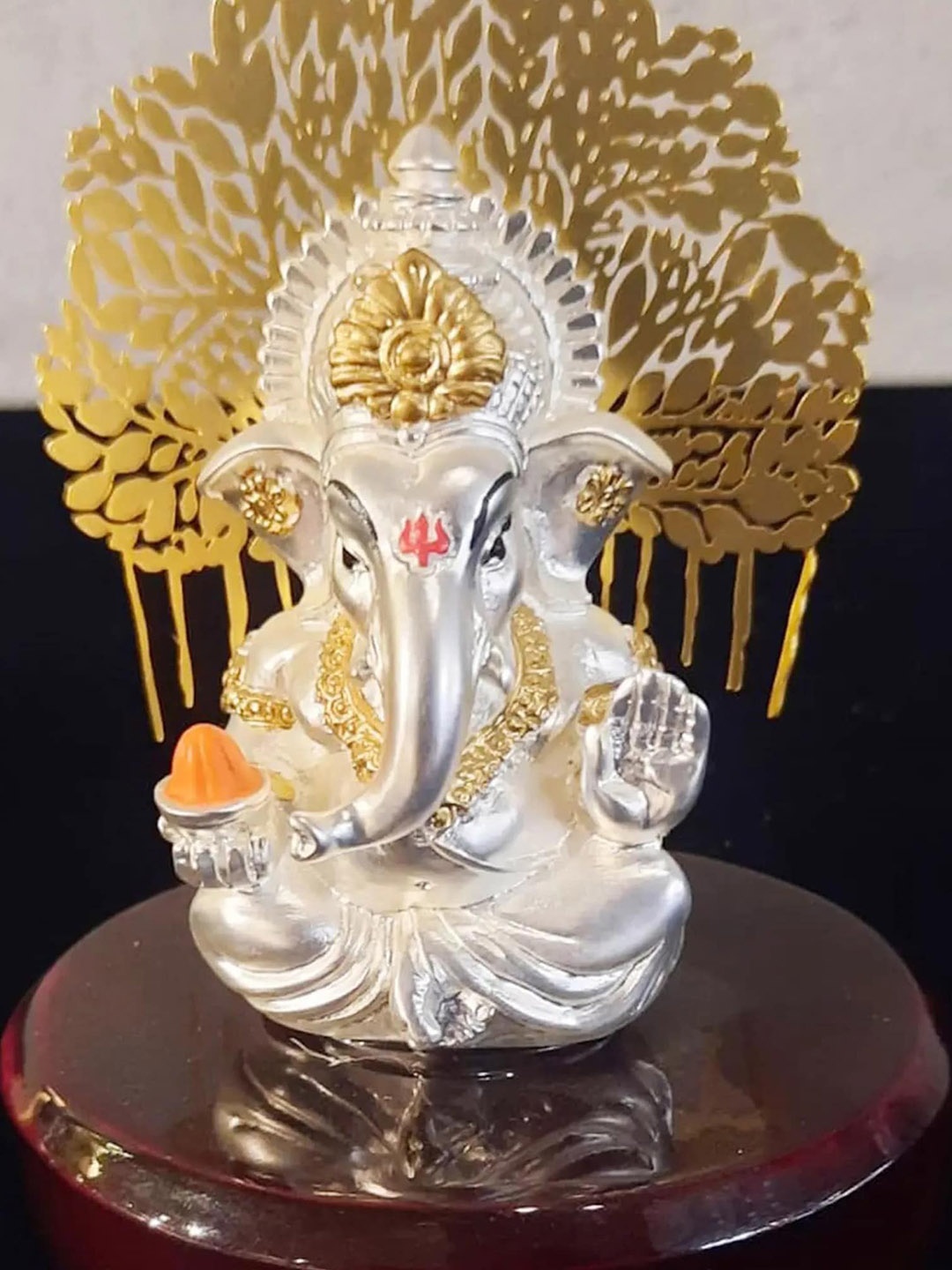 

Order Happiness White & Yellow Textured Ganesha Polyresin Idol Showpiece
